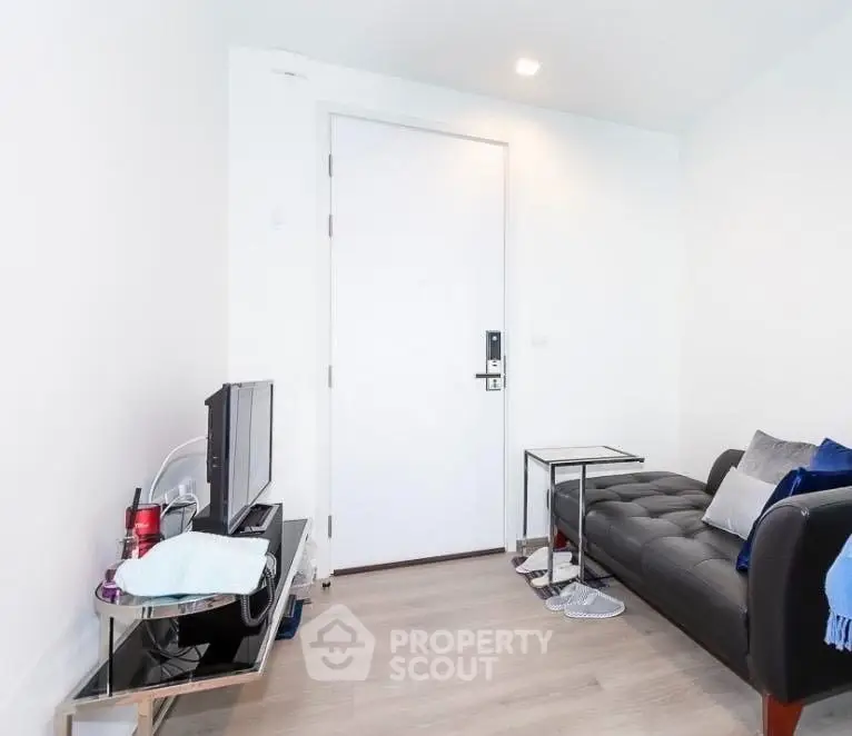 Modern living room with sleek furniture and minimalist decor