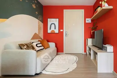 Stylish living room with modern decor and vibrant red accent wall