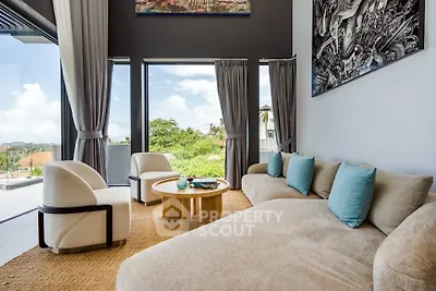 Luxurious living room with modern decor and stunning view through large windows.