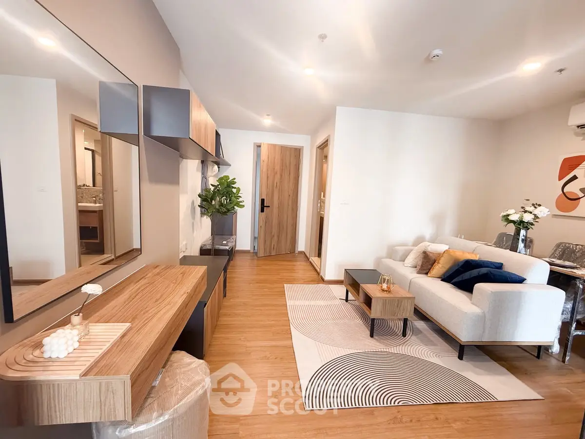 Modern living room with stylish decor and wooden flooring