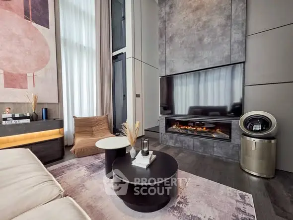 Luxurious modern living room with high ceilings and elegant fireplace