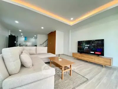 Spacious modern living room with stylish furniture and open layout