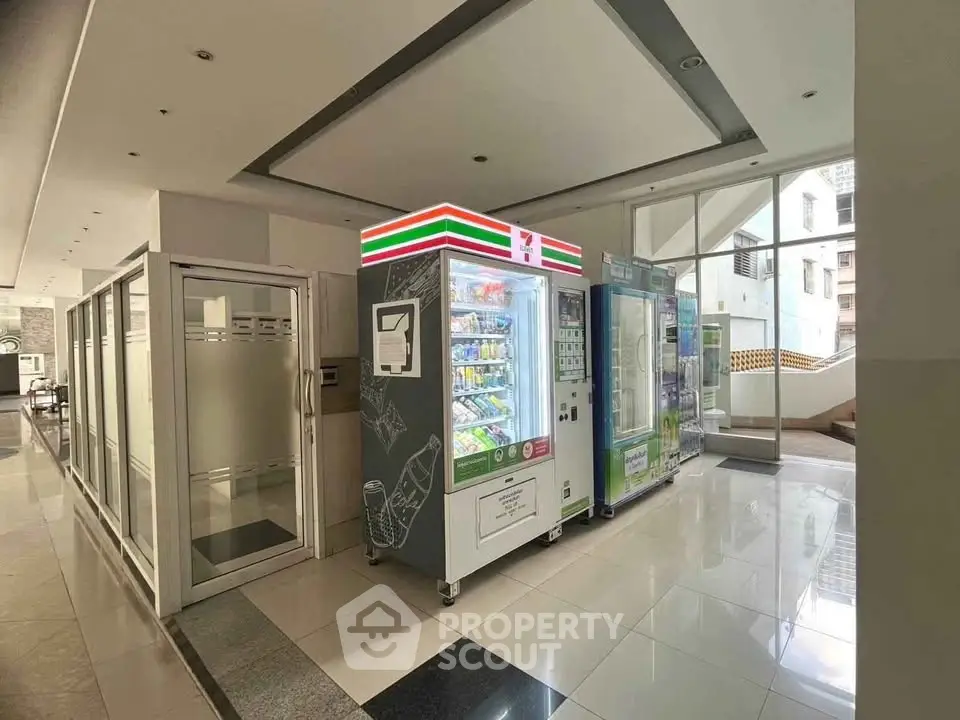 Modern building lobby with vending machines and sleek design