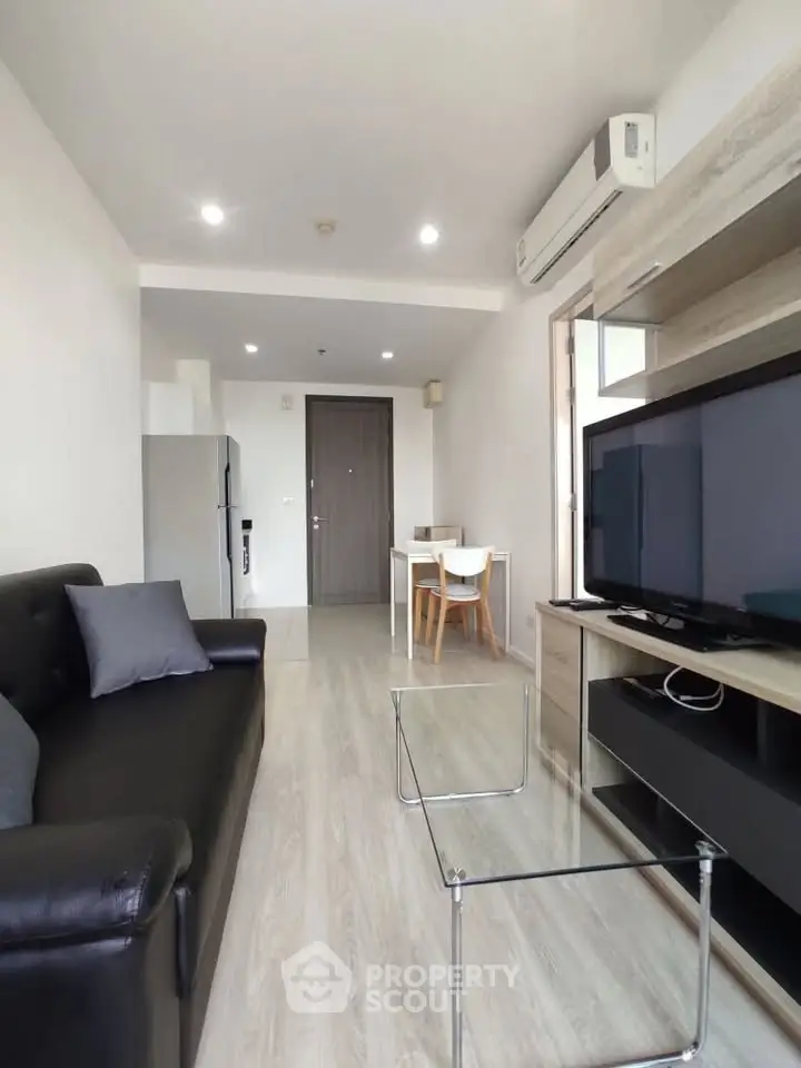 Modern living room with sleek furniture and open layout