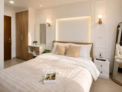 Luxurious bedroom with elegant decor and cozy ambiance, featuring a stylish bed and modern lighting.