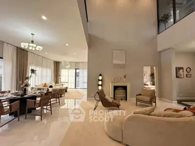 Luxurious open-plan living room with elegant dining area and modern decor