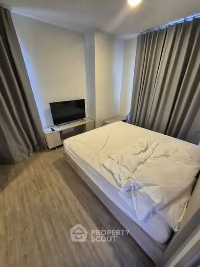 Cozy bedroom with modern decor and natural light