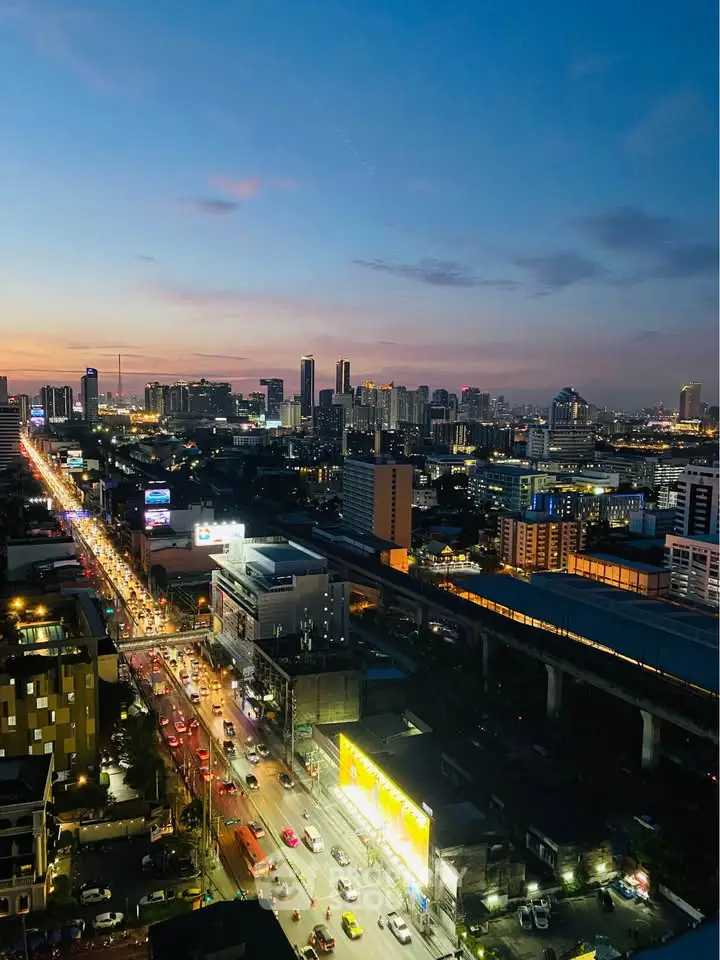Stunning cityscape view at dusk with vibrant skyline and bustling streets, perfect for urban living enthusiasts.