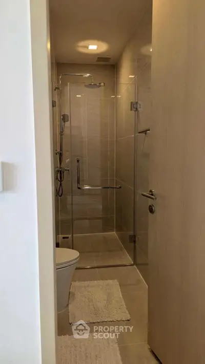 Modern bathroom with glass shower and sleek design