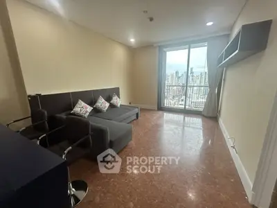Spacious living room with city view and modern furniture