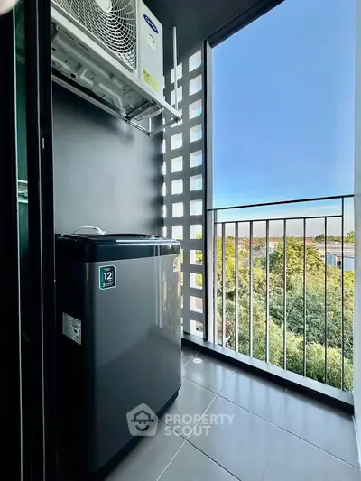 Modern balcony with washing machine and scenic view