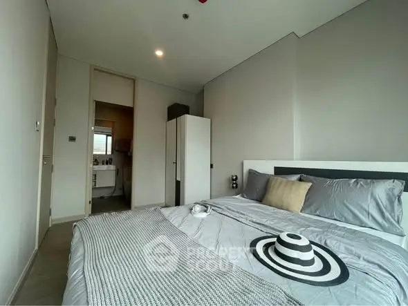 Modern bedroom with stylish decor and cozy ambiance