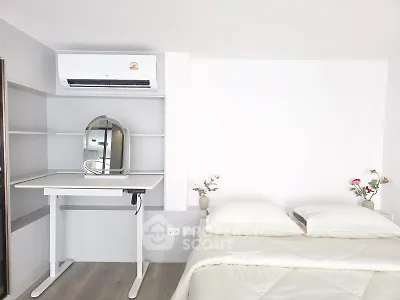 Modern bedroom with air conditioning and minimalist decor