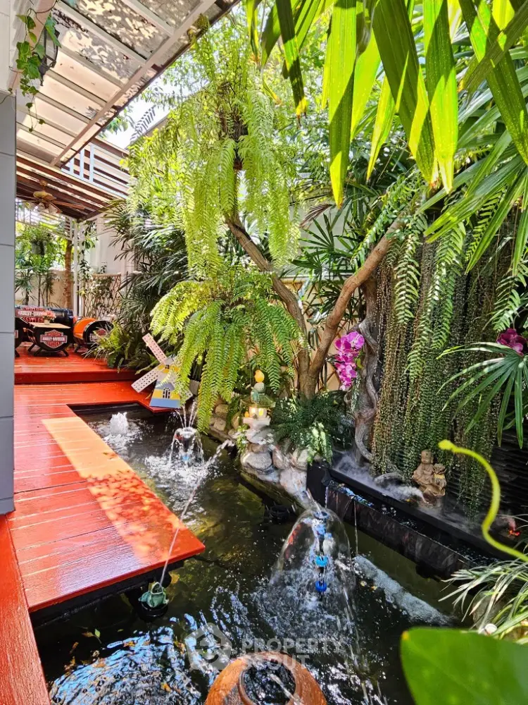 Stunning garden oasis with vibrant greenery and tranquil water features
