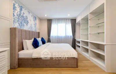 Elegant bedroom with stylish decor and ample storage space