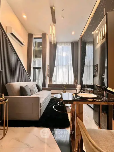 Luxurious modern living room with high ceilings and elegant decor