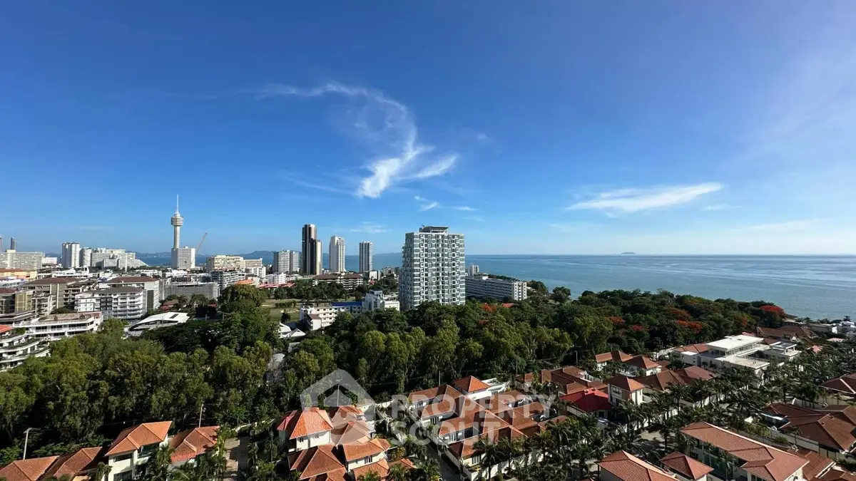 Stunning cityscape with ocean view and lush greenery, perfect for urban living enthusiasts.