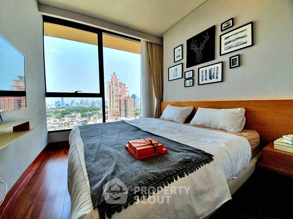 Modern bedroom with city view, stylish decor, and cozy ambiance.