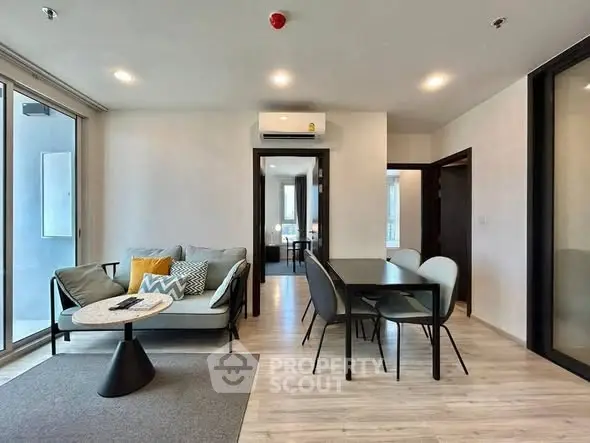 Modern living room with stylish furniture and open layout, perfect for entertaining.