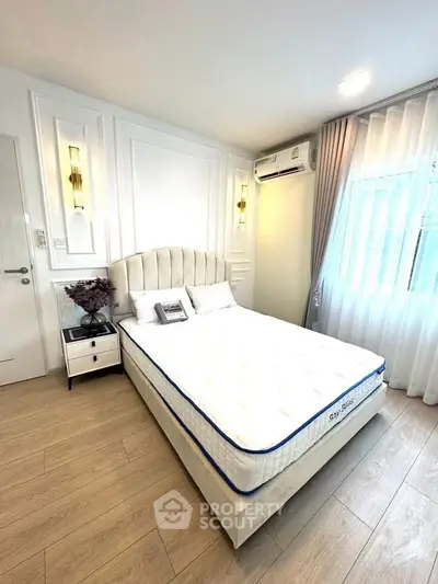 Bright and cozy bedroom with modern decor and natural light