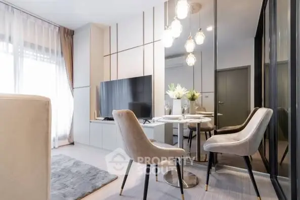 Modern living room with stylish decor and large TV