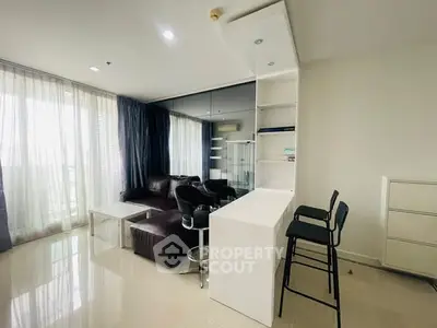 Modern living room with sleek furniture and natural light