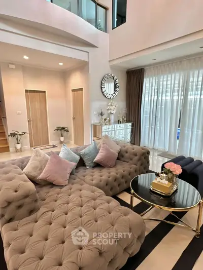 Luxurious living room with plush sofa and elegant decor in modern home
