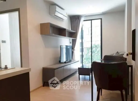 Modern living room with sleek furniture and natural light