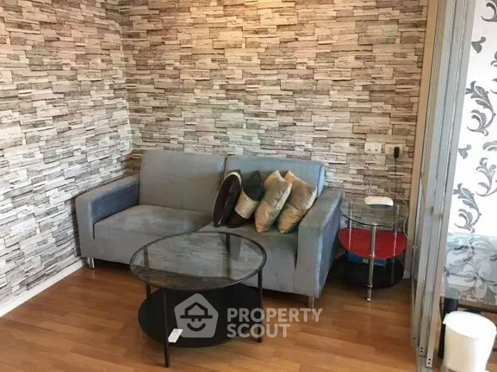 Cozy living room with modern decor and stylish stone accent wall
