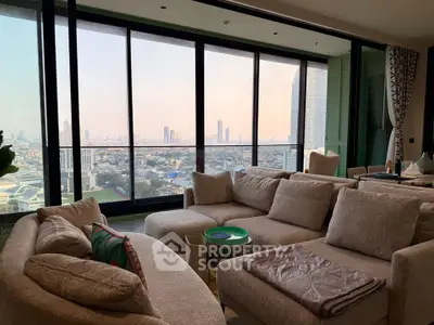 Luxurious living room with panoramic city view and elegant furnishings
