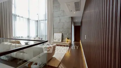 Luxurious modern living room with high ceilings and elegant decor