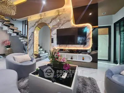 Luxurious modern living room with elegant marble accents and stylish decor