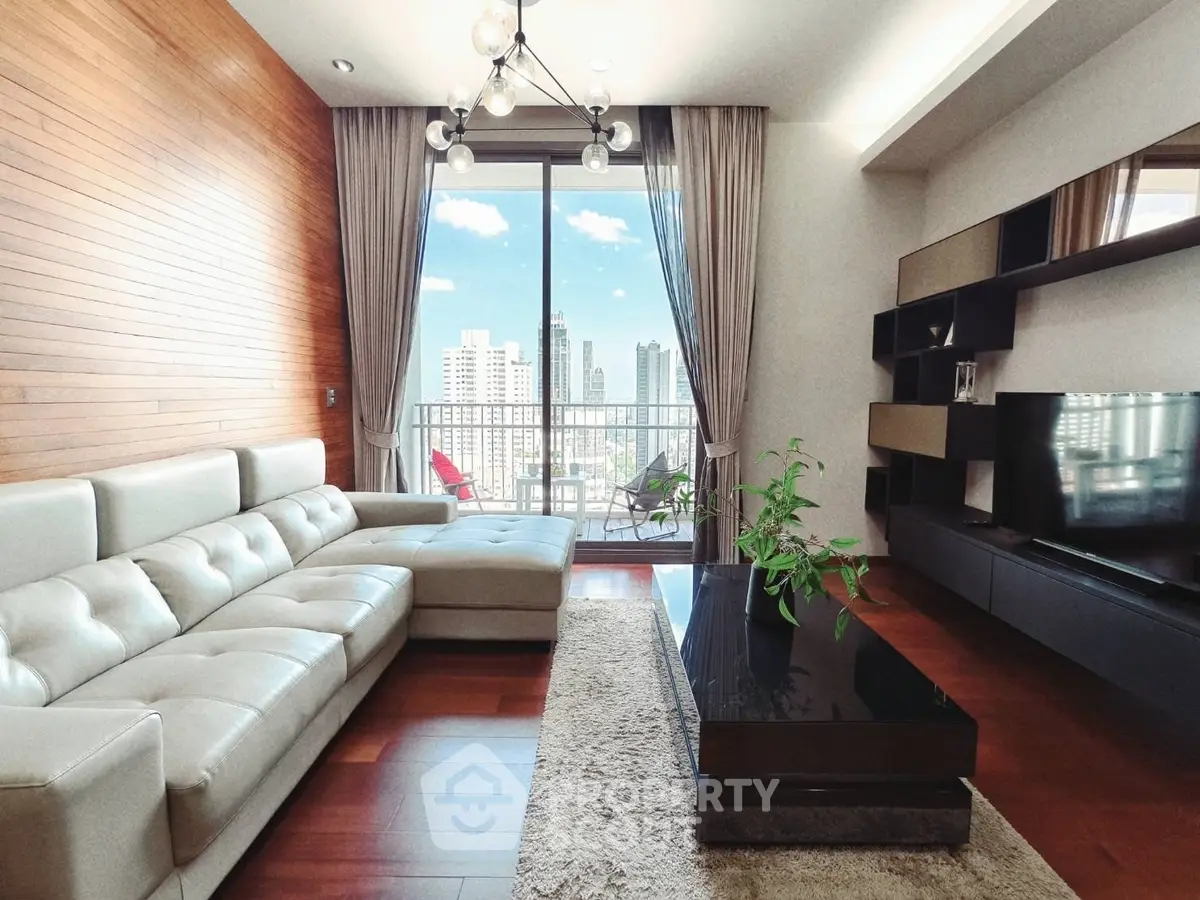 Spacious modern living room with city view and elegant furnishings