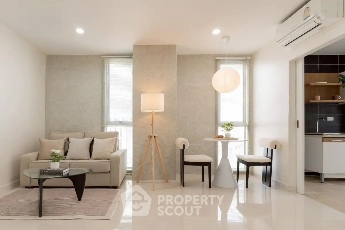 Modern living room with elegant decor and cozy seating area