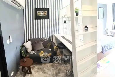 Stylish small living room with modern decor and cozy seating area