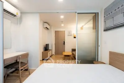 Modern studio apartment with open layout and stylish furnishings