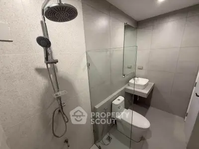 Modern bathroom with sleek shower and minimalist design