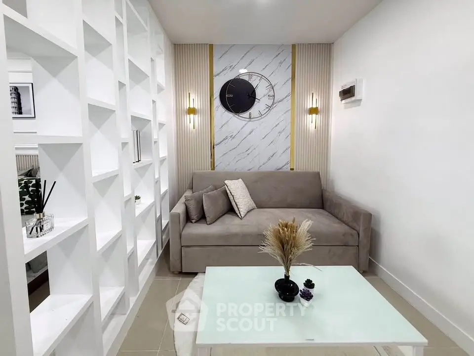 Modern living room with stylish decor and elegant shelving