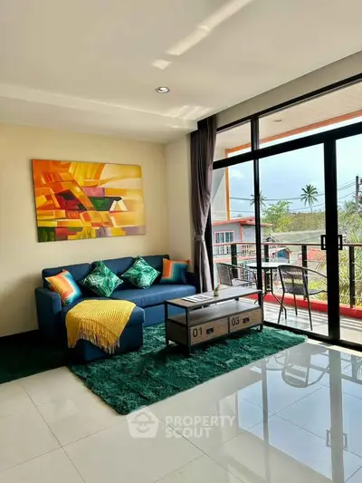 Bright living room with modern decor and balcony view, perfect for relaxation and entertaining.