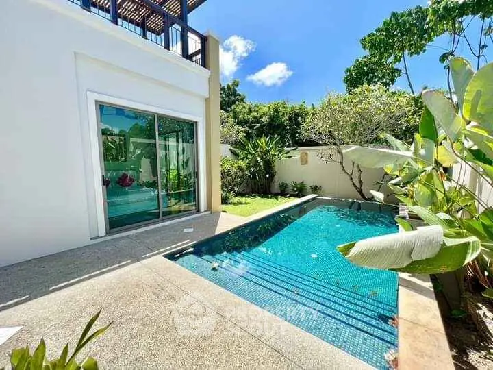 Luxurious villa with private pool and lush garden, perfect for relaxation and entertaining.