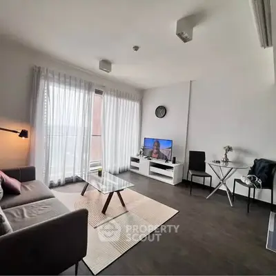 Modern living room with stylish furniture and natural light