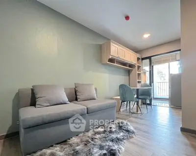 Modern living room with cozy sofa and stylish decor in bright apartment