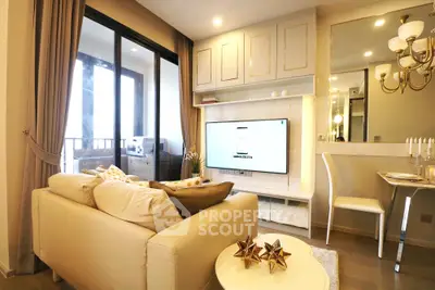 Luxurious living room with elegant decor and modern furnishings, featuring a cozy sofa and stylish lighting.