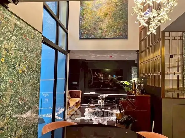 Luxurious modern living room with high ceilings and elegant decor