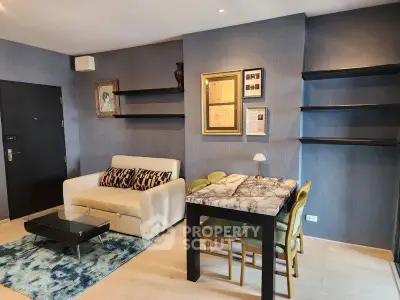 Stylish living room with modern decor and elegant dining area