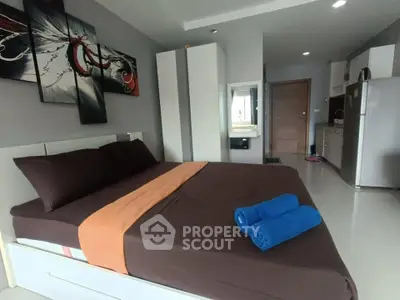 Modern bedroom with sleek design and cozy ambiance, featuring a stylish bed and contemporary decor.