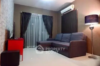 Modern living room with sleek furniture and ambient lighting