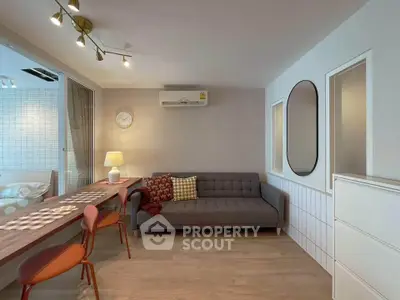 Modern living room with stylish decor and cozy seating area