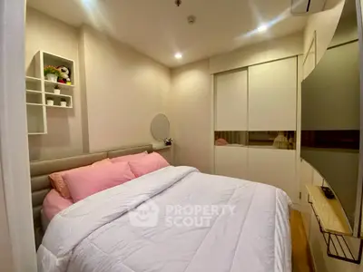 Cozy bedroom with modern decor and ample storage space