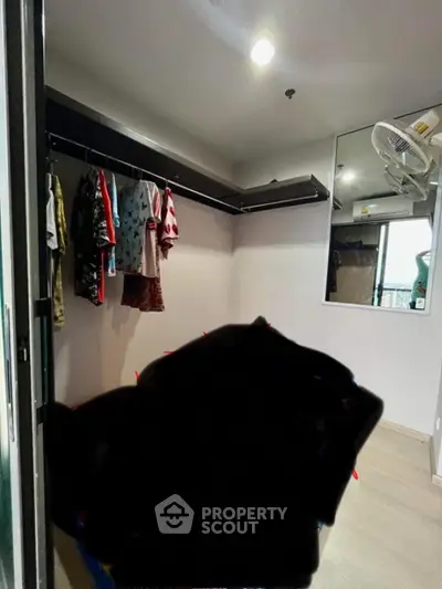 Spacious walk-in closet with modern design and ample hanging space